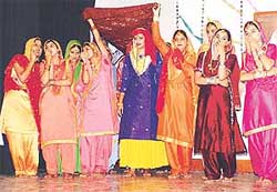 Girls perform at a talent search competition in Guru Gobind Singh College for Women