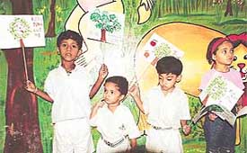 Students of Dikshant International School, Panchkula, display banners promoting afforestation 