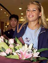 Russian tennis star Anna Kournikova arrives in China's business capital