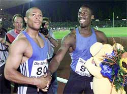 Britain�s Dwain Chambers (right) is congratulated by US runner Maurice Green after the men�s 100m