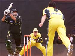Pakistan's team captain Waqar Younis misses the ball