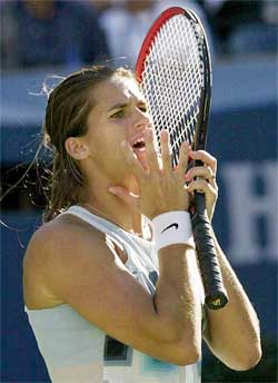 Amelie Mauresmo of France reacts to a line call