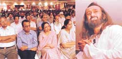 Sri Sri Ravi Shankar delivers a lecture at a function