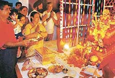 Devotees perform Ganesha pooja to celebrate Shree Sarvajaneek Ganeshotsava-2000 in Maharashtra Bhavan, Sector 19, Chandigarh, on Tuesday.