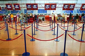 Empty British Airways check-in areas are seen at London's Heathrow airport 