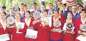 NCC cadets display trophies, awarded to them for participation in the Republic Day Parade Camp in New Delhi, at Haryana Raj Bhavan in Chandigarh on Thursday