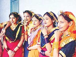 Students participate in a talent hunt contest at Ramgarhia College