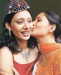 Avneet of B.Com being greeted by a friend after being declared Ms Fresher of Guru Nanak Girls College