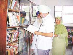 Dr S.S. Johal takes a round of a library of the Master Tara Singh Memorial College for Women