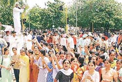 College students block traffic outside the Panjab University gate on the road dividing Sectors 14 and 15 in Chandigarh on Saturday