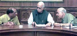 Deputy prime minister L.K.Advani with Delhi Pradesh BJP president Madan Lal Khurana and senior BJP leader Vijay Kumar Malhotra