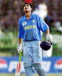 India's Mohammad Kaif reacts after completing his century during their match against Zimbabwe