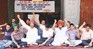 Students stage a dharna in support of their demands at the Students Centre