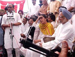 Madhya Pradesh Chief Minister Digvijay Singh addresses an election rally in Jammu