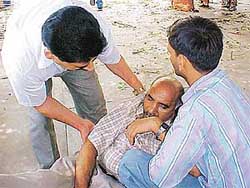 Mr Ashok Kumar, a teacher with Sanatan Vidya Mandir Senior Secondary School, attended to by other teachers when he collapsed allegedly due to hypertension 