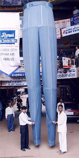 Tailor Srikant Belamakar and his co-workers show the 17� feet long trouser