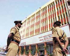 Police officers stand guard outside the newly inaugurated Police Bhawan in the Capital on Wednesday.
