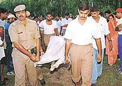 The body of 19-year-old CRPF kayak, Ravi Ankit, being brought out of the Sukhna Lake on Thursday morning. 