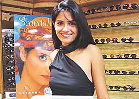 Sohini Jaitly, a model from Mumbai, launches the "Confidence contact and me" campaign at a shop in Sector 17 in Chandigarh 