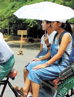 With the weather clearing, tourists stepped outdoors for sightseeing