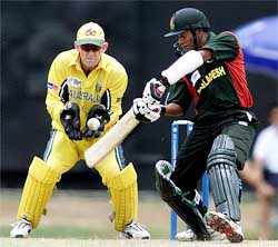 Bangladeshi batsman Alok Kopali hits a delivery