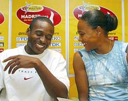 World record holder Tim Montgomery of the USA smile with his girlfriend Olympic champion Marion Jones
