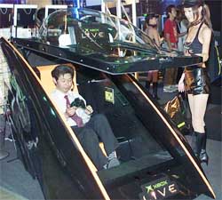 A Japanese man tries out Microsoft Corp's latest Xbox video game