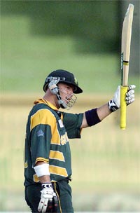 Herschelle Gibbs acknowledges his century during the pool match between Kenya and South Africa
