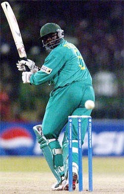 Kenya's Steve Tikolo plays a shot during a pool match