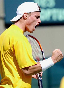 Lleyton Hewitt celebrates winning a point during his match against Harsh Mankad