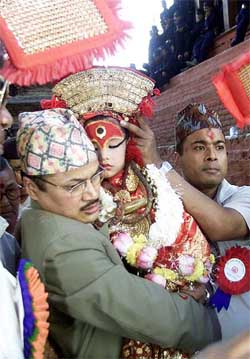 Exhausted Living Goddess Kumari falls sleep