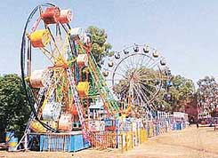Contractors have set up joy rides for Dasehra Mela in a park adjoining the Daresi Grounds in Ludhiana