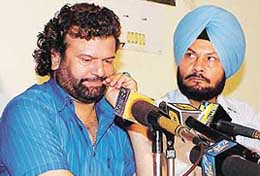 Hans Raj Hans in a contemplative mood in Chandigarh Press Club on Saturday following threats to his life by underworld.