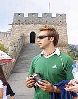 Australian swimmer Ian Thorpe tours the Great Wall of China
