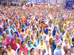 Women listen to speeches