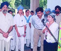 Namaste: A delegate from the Land of the Rising Sun addressing the students of GHPS, India Gate