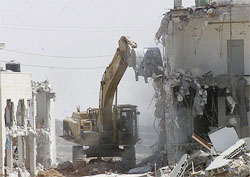 Israeli army continues to destroy buildings
