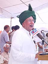 Chief Minister Om Prakash Chautala addresses a War Heroes and Martyrdom Day rally at Jhajjar on Monday