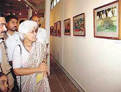 Ms Neeru Nanda, Adviser to the UT Administrator, has a look at the second annual photo exhibition by the Chandigarh Photo Journalists Association 