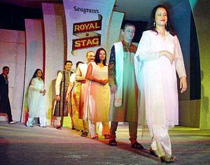 Film stars of yesteryears take part in a fashion show