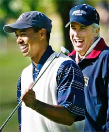 Tiger Woods laughs with the United states team captain