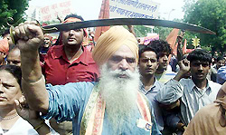 Activists of the Vishwa Hindu Parishad demonstrate near Parliament House