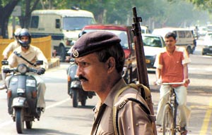 An armed policeman at Mandir Marg in front of Birla Mandir