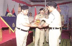 BSF Director-General Ajay Raj Sharma felicitating