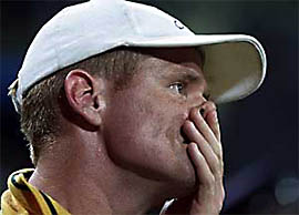 South Africa's captain Shaun Pollock covers his face