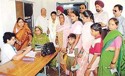 Patients being checked up in a free medical health camp