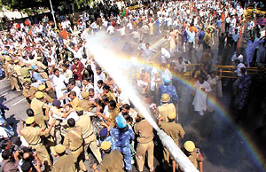 Police using a water cannon to disperse BJP activists demonstrating near the Pakistan High Commission 
