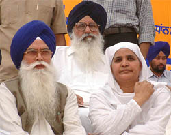 Former Chief Minister Parkash Singh Badal with SGPC chief Kirpal Singh Badungar and former SGPC chief Bibi Jagir Kaur
