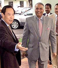 Noordin Sopiee, chairman of the Institute of Strategic and International Studies ISIS shows the way to Indian Foreign Minister Yashwant Sinha
