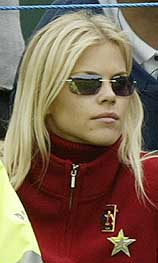 Tiger Woods' Swedish girlfriend Elin Nordegren watches him under the close protection